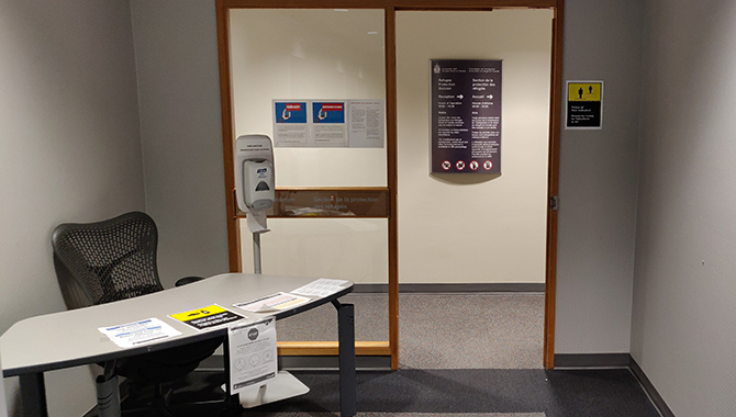 Near the elevator lobby, there is a screening station with a hand sanitizer and 2-metre physical distancing sign to remind you to wash your hands before and after accessing the public areas.