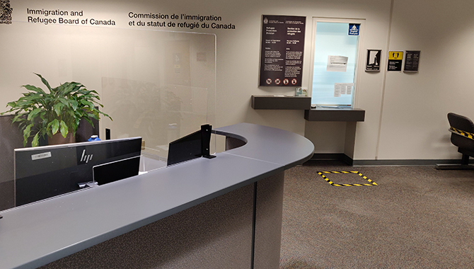 Upon arrival on the 18th floor, you must report to the screening station near the commissionaire’s desk behind plexiglass. The public seating is blocked off. There are hand washing and 2-metre physical distancing signs in the common areas.